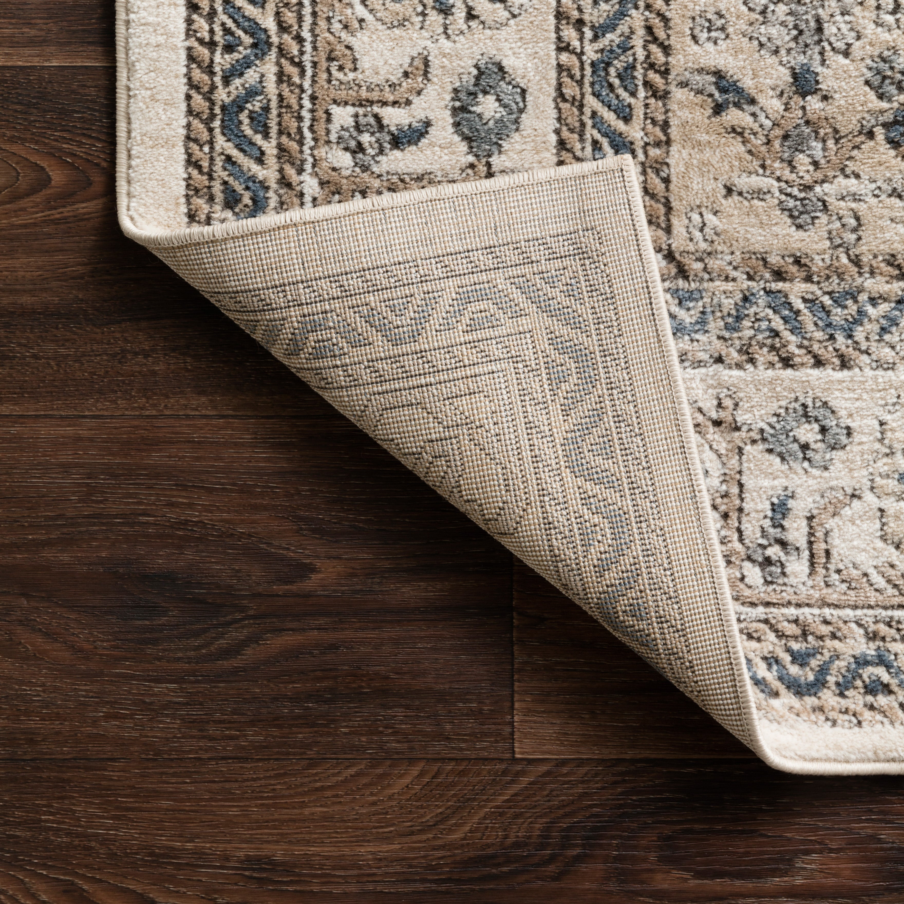 Charlise Polypropylene & Polyester Pile Rug in Natural / Navy