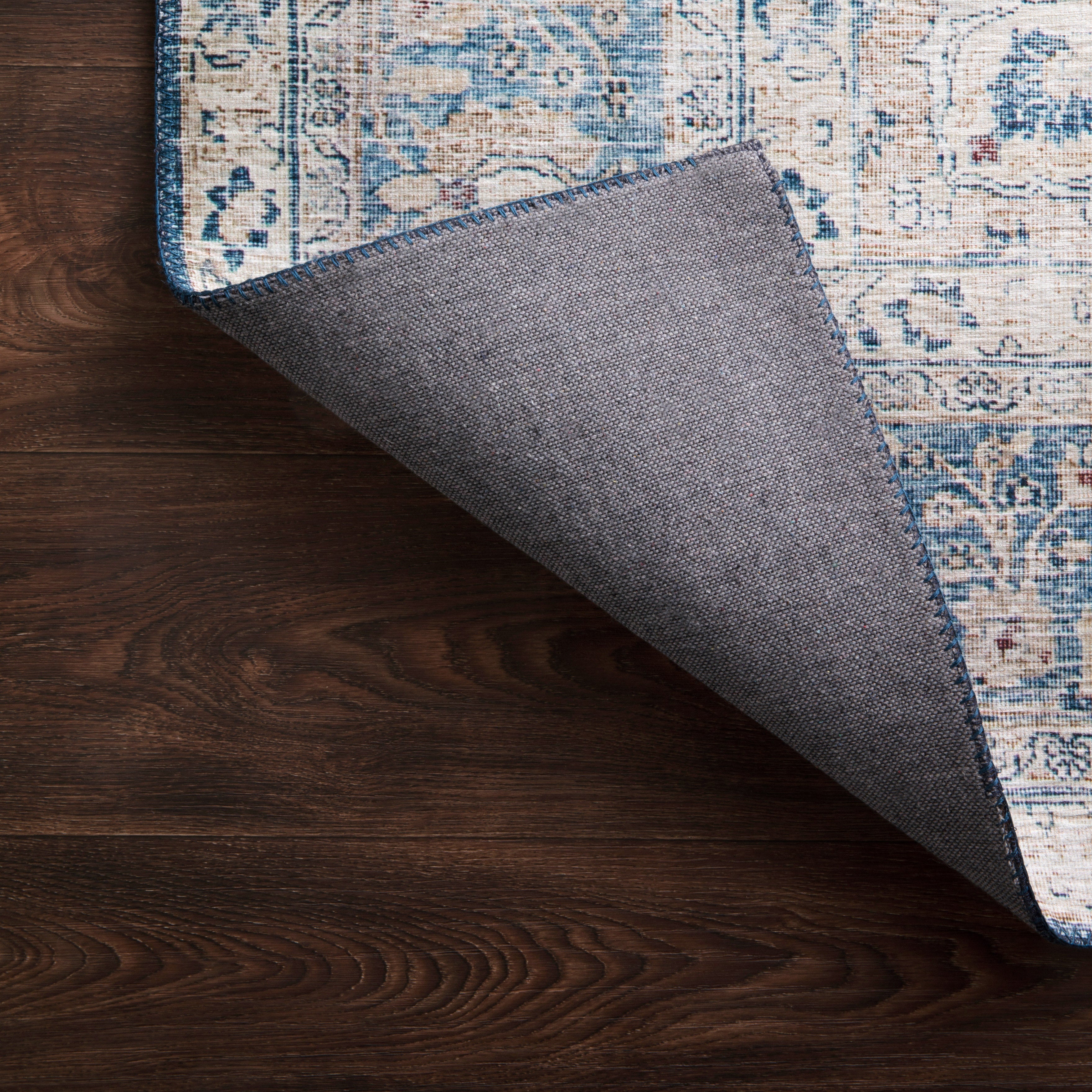 Hutchinson Polyester Face Rug in Marine / Peach