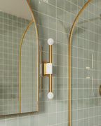 Larson Wall Sconce in Aged Brass